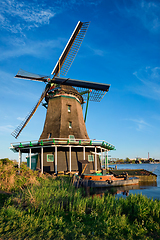 Image showing Windmills at Zaanse Schans in Holland on sunset. Zaandam, Nether