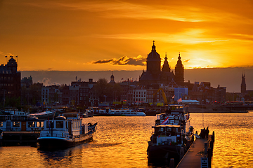 Image showing Amsterdam cityscape skyline with Church of Saint Nicholas on su