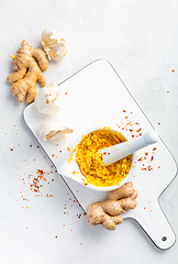 Image showing Homemade Fresh Ginger and Garlic paste or Adrak Lahsun puree in ceramic bowl