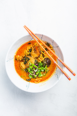 Image showing Thai red curry noodle soup with shiitake,  coconut milk and onions