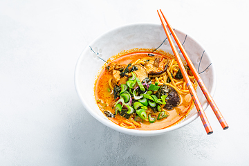 Image showing Thai red curry noodle soup with shiitake,  coconut milk and onions