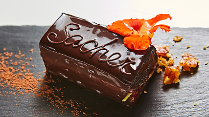 Image showing A piece of Sacher cake. Shallow dof.