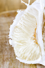 Image showing Peeled ripe yellow grapefruit