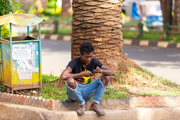 Image showing Young man use mobile phone, Ethiopia