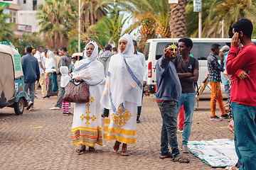 Image showing Orthodox Christian pilgrim at worship on the street during easter