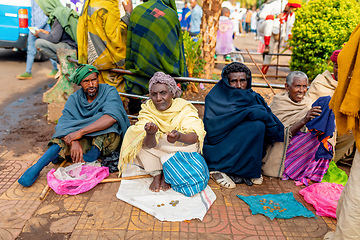 Image showing Begging people on the street at Easter