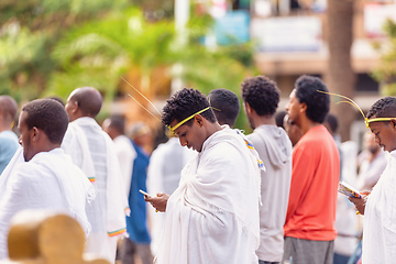 Image showing Orthodox Christian pilgrim at worship on the street during easter