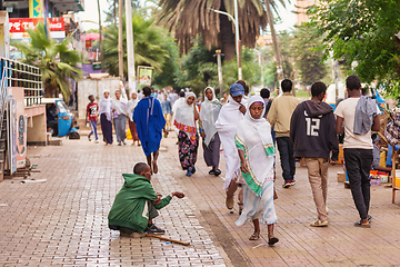 Image showing Begging people on the street at Easter