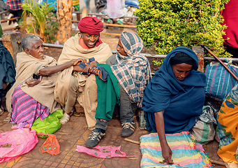 Image showing Begging people on the street at Easter