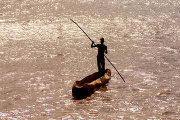 Image showing wooden coarse boat on mystical Omo river, Ethiopia