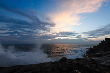 Image showing Rocky coast at sunset