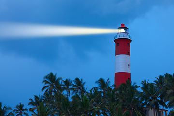 Image showing Lighthouse in night with light beam