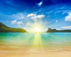 Image showing Long tail boats in bay. Thailand