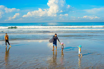 Image showing Surfers family children beach. Bali 