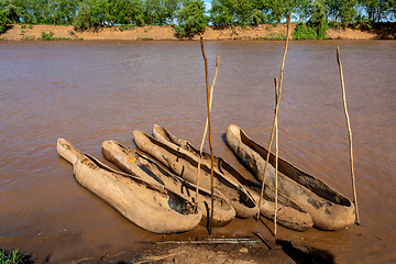 Image showing wooden coarse boat on mystical Omo river, Ethiopia