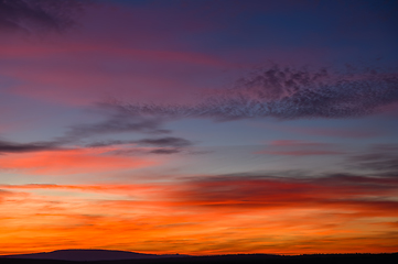 Image showing very colorful red, blue, orange and violet late sunset