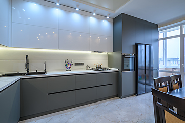 Image showing Luxury white and dark grey modern kitchen interior