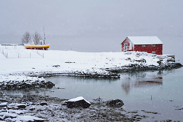 Image showing Red rorbu house in winter, Lofoten islands, Norway