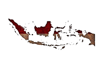 Image showing Map and flag of Indonesia on rusty metal