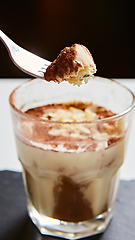 Image showing Tiramisu in glass, traditional coffee flavored Italian dessert made of ladyfingers and mascarpone.