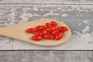 Image showing Gojiberry on wooden spoon and timber