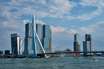 Image showing View of Rotterdam cityscape with Erasmusbrug bridge over Nieuwe Maas and modern architecture skyscrapers