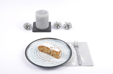 Image showing Christmas stollen on plate with christmas decoration