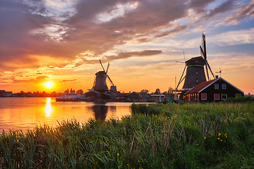 Image showing Windmills at Zaanse Schans in Holland on sunset. Zaandam, Nether