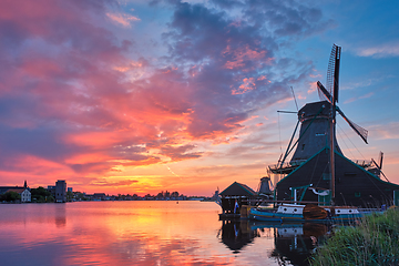 Image showing Windmills at Zaanse Schans in Holland on sunset. Zaandam, Nether