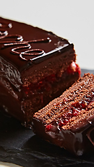 Image showing A piece of Sacher cake. Shallow dof.
