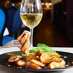 Image showing The grilled squid with salad. Shallow dof.