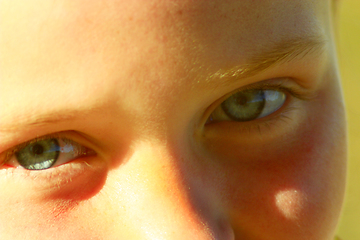 Image showing teen's blue eyes staring up