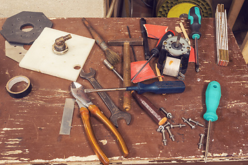 Image showing tools on table in workshop room