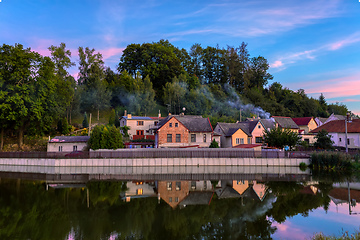 Image showing village houses reflection in water