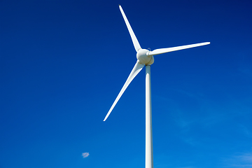 Image showing Wind generator turbines in sky