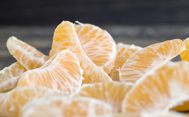 Image showing slices of tangerine without peel