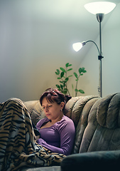 Image showing brunette woman reading books at home