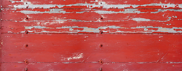 Image showing Old wood board painted red. Banner background