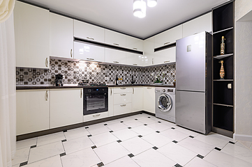 Image showing Black and white modern kitchen interior