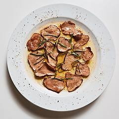 Image showing Fried beef tongue with coarse salt. Grilled beef tongue.