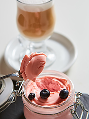 Image showing Fresh strawberry yoghurt dessert in glass, selective focus.