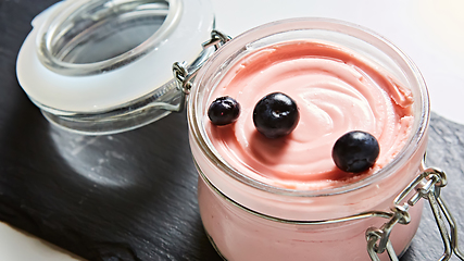 Image showing Fresh strawberry yoghurt dessert in glass, selective focus