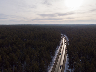 Image showing Aerial view of a road in winter landscape