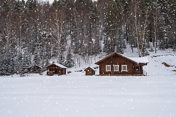 Image showing Winter holiday house in forest.