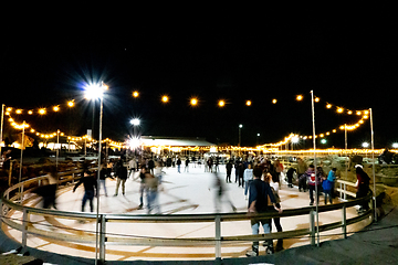 Image showing beautiful outdoor ice rink at night with lights