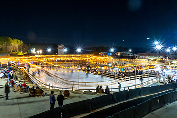 Image showing beautiful outdoor ice rink at night with lights