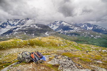 Image showing Backpacker\'s bag on top of mountain