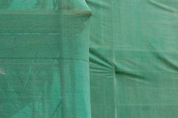 Image showing scaffold under debris netting at construction site