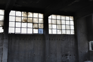 Image showing windows and concrete wall in factory interior