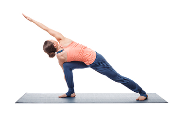 Image showing Young fit woman doing Ashtanga Vinyasa Yoga